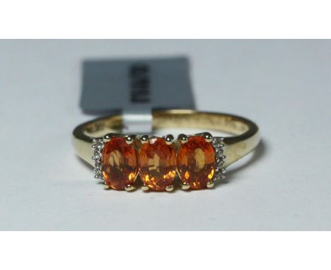 Gemporia yellow metal marked 10K ring set with topaz semi-precious stones 