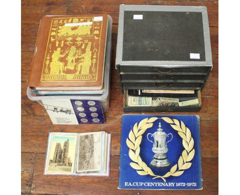 A collection of cigarette cards, silks and postcards including WW1, in five photograph albums, together with a small 4-drawer