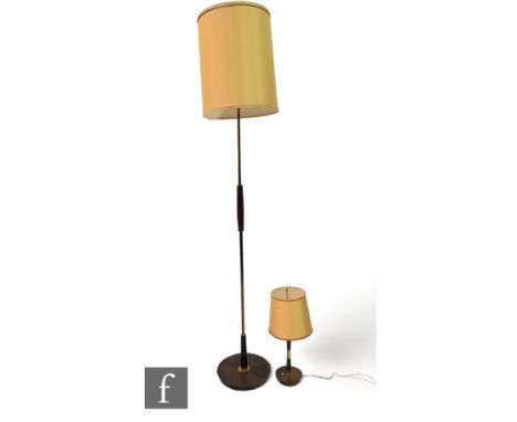 Unknown - A Mid Century teak and copper coloured standard lamp, rising from a circular base, with yellow fabric shade, height