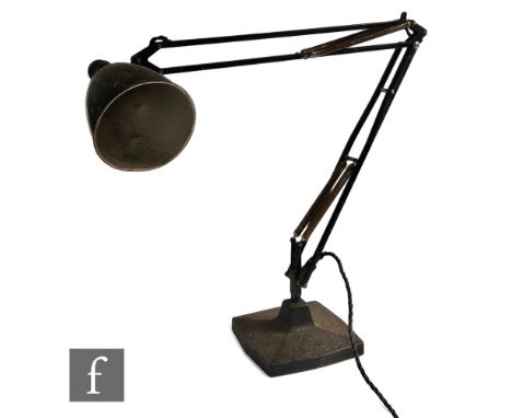 Herbert Terry &amp; Sons - A 1933 model 1208 black anglepoise type lamp, the four-string example rising from a heavy cast bas
