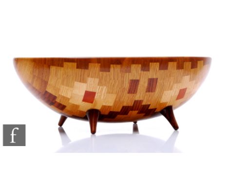 Bill Robinson - A contemporary segmented woodturned footed bowl of ovoid form, decorated in a diamond pattern, formed of two 