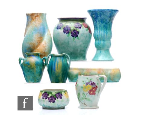 Various Manufacturers - A collection of Art Deco ceramic vases, all with a pale green art glaze ground, to include three by B