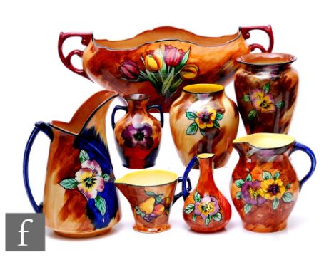 R. Grocott - Hollingshead &amp; Kirkham (H&amp;K Tunstall) - A collection of 1930s vases and jugs, each hand painted with a f