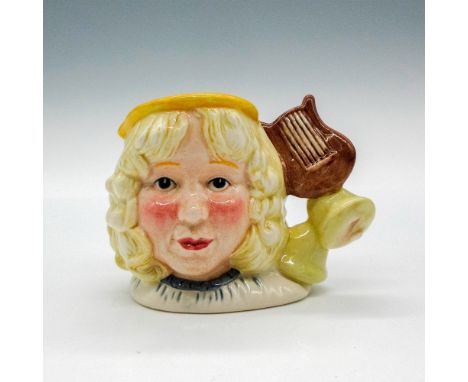 White, light brown, and yellow coloration.This jug was issued in the U.S.A. only, but made available to all members of the Ro