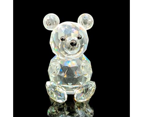 This retired bear figurine is made of clear facetted crystal with black nose and eyes. Swarovski acid stamp on bottom. The bo