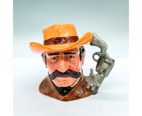 Part of the Wild West Collection; brown coat, light brown hat with a brown band. Gun and sheriff's badge handle. Royal Doulto