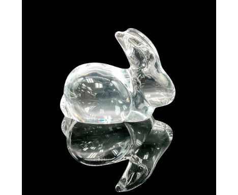 A small, clear figure of a rabbit resting. Daum marked. This item has its original box: 4.75"L x 4.75"W x 3"H. Dimensions: 3.