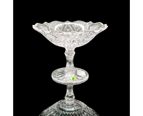 Elegant clear-cut crystal with fluted edge and starburst base. Waterford acid mark and sticker. 1056511. This item has its or