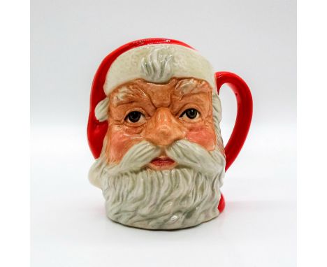 Hand decorated in England, this mug's handle has red and white coloration.Royal Doulton backstamp. This item has no reserve. 