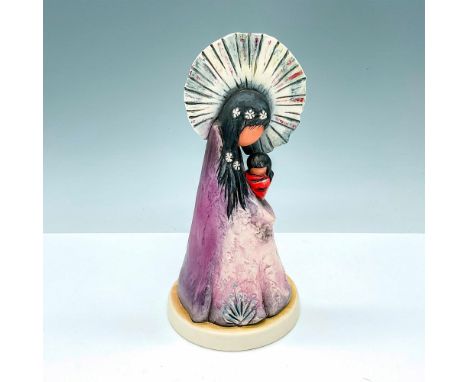 This hand painted porcelain figurine from Goebel, created by the artistry of Ted DeGrazia, depicts the Madonna with Child. Im