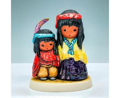 This hand painted porcelain figurine from Goebel, created by the artistry of Ted DeGrazia, depicts two children in colorful d