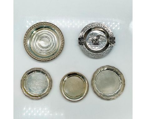 Five small silver plates with different patterns. Peruvian sterling silver ashtray with detailed llama in low-relief, marked 