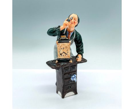 Hand decorated figure of a man building a clock. Royal Doulton backstamp. Artist: M. NicollIssued: c. 1961-1975Dimensions: 4"