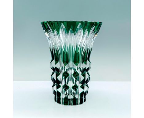 A clear and jade colored crystal vase with unique raises and grooves throughout the design. Signed Val Lambert. This item has