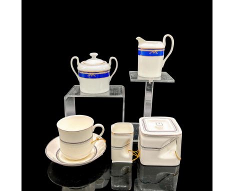 Bone china replicas of tea service items from ships The Queen Mary and The Titanic. Queen Mary items: square teapot 3.25"L x 