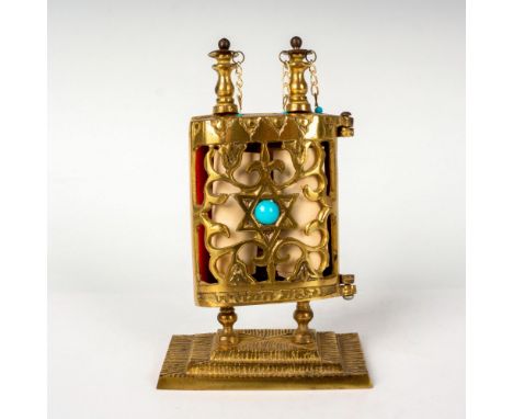 A show piece case with miniature Hebrew Sefer scripture print on a scroll; outer shell decorated with the Star of David, and 
