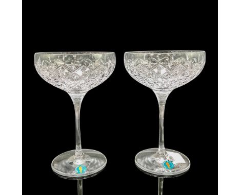 Includes set of 2 crystal glasses with cross hatch and teardrop design. Waterford acid mark and stickers. 1065208. This item 