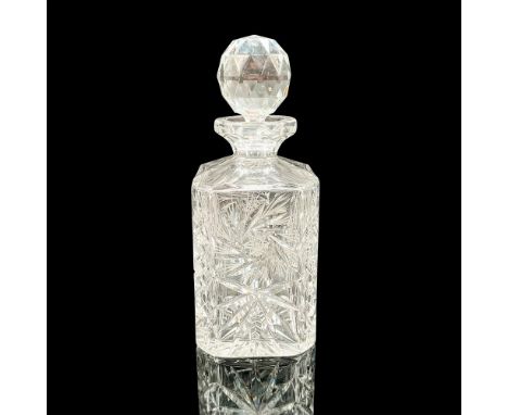 Beautiful clear crystal decanter with etched pinwheel design embellished with fan and diamond cuts. This item has its origina