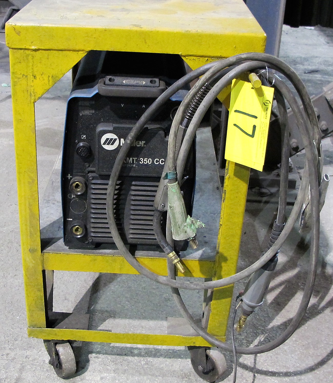 MILLER XMT 350 CC/CW WELDER, S/N LH160463A W/ CABLES &amp; CART