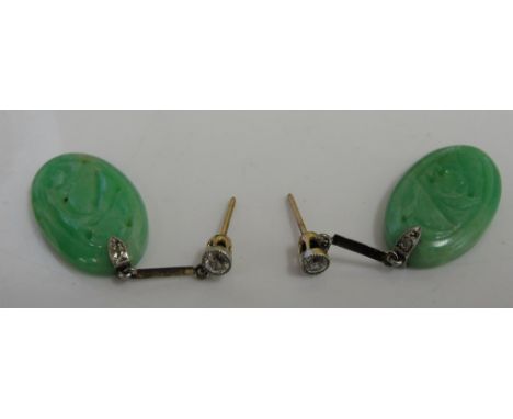 A pair of jade and diamond drop earrings