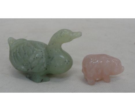 A jade figure of a duck and pig