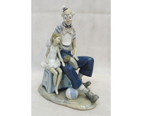 A large Lladro group of a clown and ballerina