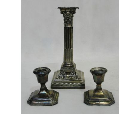 A HM silver candlestick; together with a pair of HM silver squat candlesticks