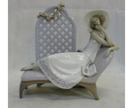 A Lladro lady reclining on a daybed : Limited Edition and signed 'Special Commission'