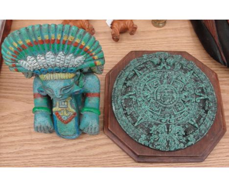 A small Aztec calendar; together with a Mayan god of maize