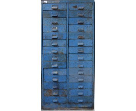 AN EARLY 20TH CENTURY METAL CABINET OF 28 DRAWERS, some containing tools, nuts, bolts, washers etc, 64cm x 139cm