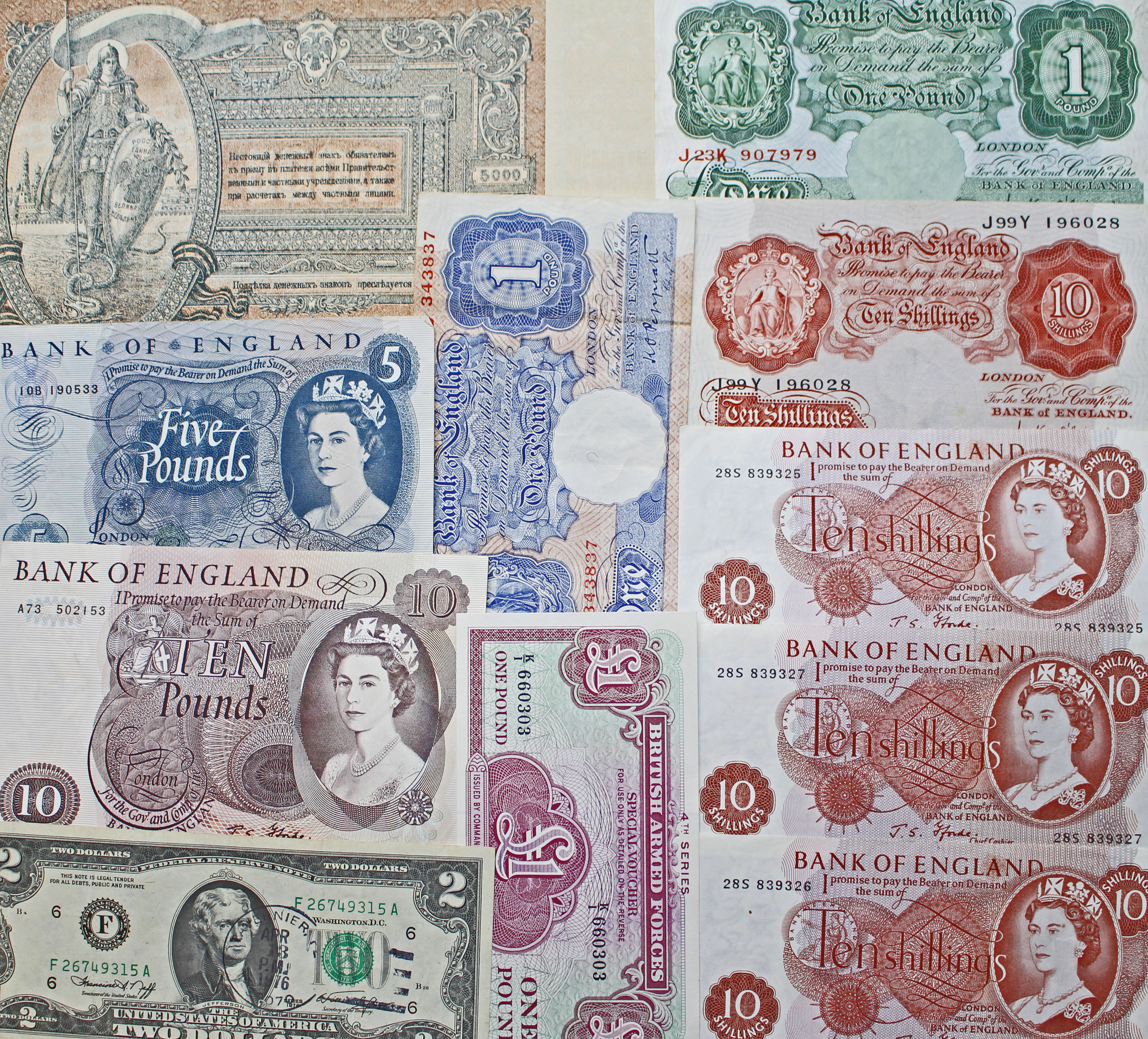 AN ALBUM OF VARIOUS PRE DECIMAL BANK NOTES Mainly British To Include £1 ...