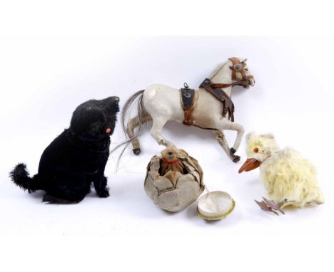 A 19TH CENTURY FRENCH TOY in the form of a Rabbit appearing out from a lettuce 7cm high together with an automaton cat, a chi