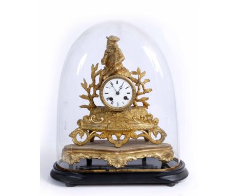 A FRENCH GILT METAL MANTLE CLOCK, white enamel dial, striking drum movement under a glass dome, the clock 29cm high
