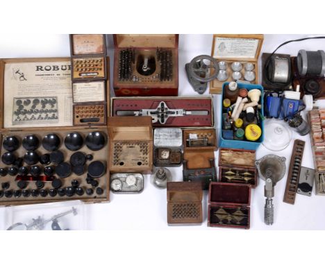 A COLLECTION OF VARIOUS CLOCK AND WATCH RELATED PARTS, tools and other items