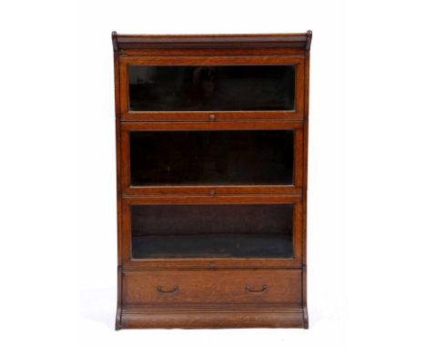 A GLOBE WERNICKE FOUR GLAZED SECTIONAL BOOKCASE, 86cm wide x 160cm high