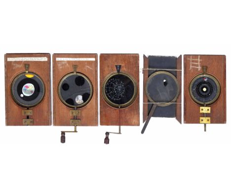 A GROUP OF FIVE AUTOMATON MAGIC LANTERN SLIDES relating to stars and the solar system