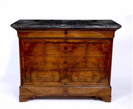 AN EMPIRE MARBLE TOPPED WALNUT COMMODE of four drawers 130cm wide x 98cm high 