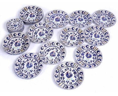 A MODERN DERUTA POLYCHROME POTTERY DINNER SERVICE of twenty two pieces, 24cm plates