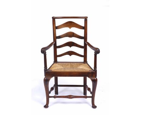 A 19TH CENTURY NORTH COUNTRY WALNUT LADDER BACK OPEN ARMCHAIR with scrolling arms, 66cm wide 