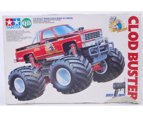 TAMIYA: An original vintage Tamiya ' Clod Buster ' 1:14 scale radio controlled monster truck car. Within the original box. Co