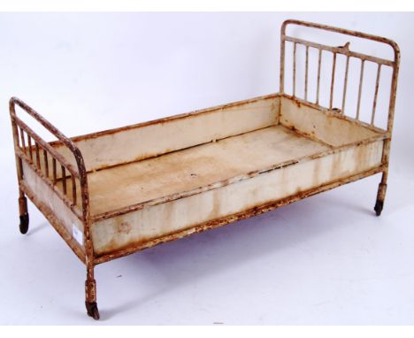 EDWARDIAN DOLLS BED; An unusual large early 20th century Dolls / Bears toy bed, in the style of a hospital bed. Made of tin, 