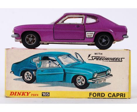 DINKY: An original vintage Dinky Toys 165 diecast model Ford Capri  ' With Speedwheels '. Very near mint model, with a very n