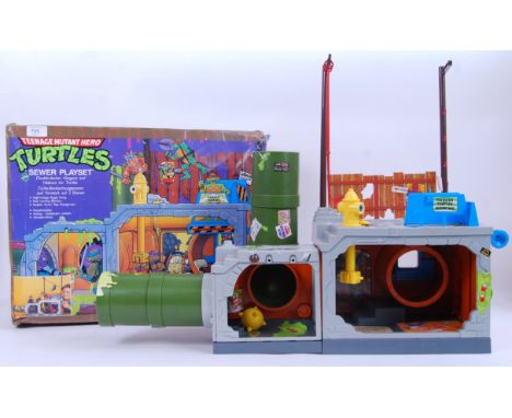 TEENAGE MUTANT HERO TURTLES; An original vintage 1990's made Teenage Mutant Ninja / Hero Turtles ' Sewer Playset ' action fig