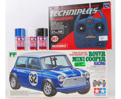 TAMIYA: A Tamiya 1:10 scale Rover Mini Cooper radio controlled car. Appears to be fully built and ready to race. Appears to h