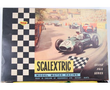 SCALEXTRIC: A vintage boxed Scalextric GP33 racing set. Appears to be complete (but unchecked), with original cars, controlle
