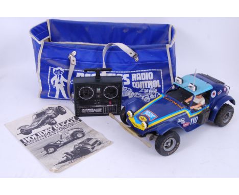 TAMIYA: an original vintage 1980's Tamiya scale model Radio Controlled ' Holiday Buggy ' car. Appears within the original Bea