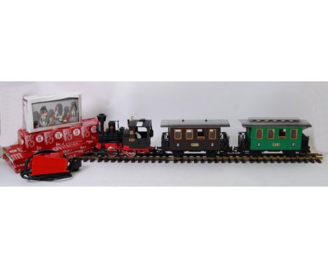 LEHMANN G SCALE: An original large scale ' G ' scale Lehmann model railway trainset layout. Comes with loco, 2x carriages, bo