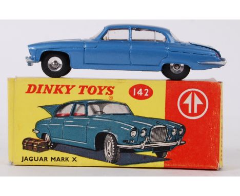 DINKY: An original vintage Dinky Toys diecast model No 142 Jaguar Mk X. Mint+ condition. Blue body, complete with suitcase / 