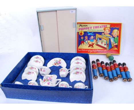 TOYS & GAMES: A good collection of assorted vintage classic toys and games to include a charming ' My Own Puppet Theatre ' bo