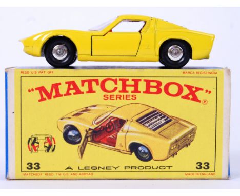 MATCHBOX LESNEY: An original vintage Matchbox Lesney Series diecast model No. 33 Lamborghini Miura. Yellow body, black plasti